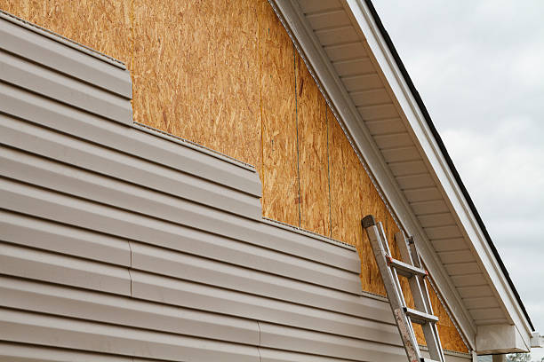 Professional Emergency Siding Repair technician working in Loudonville, NY